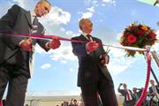Janez Novak, left, and Sir David McMurtry cutting the ribbon at the new RLS facilities